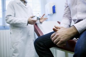 talking with a doctor about car crash