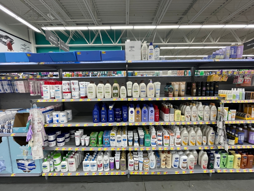 Grovetown, Ga USA - 09 26 23: Walmart retail store interior skin lotion section and prices
